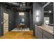 Modern basement with stylish lighting, an open staircase, a dining area, and a unique flooring design at 1860 Mountain Shadow, Stone Mountain, GA 30087