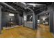 Basement with an open floor plan, dining area, and concrete floors at 1860 Mountain Shadow, Stone Mountain, GA 30087