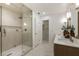 Well-lit bathroom with modern shower, dual sink vanity, and tiled floors at 1860 Mountain Shadow, Stone Mountain, GA 30087