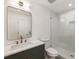 Bathroom featuring stylish vanity with a sink and a walk-in shower with glass enclosure at 1860 Mountain Shadow, Stone Mountain, GA 30087