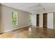 Cozy bedroom featuring ample closet space and multiple windows with scenic views at 1860 Mountain Shadow, Stone Mountain, GA 30087