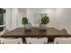 Contemporary dining room featuring an expansive wooden table with seating for eight at 1860 Mountain Shadow, Stone Mountain, GA 30087