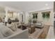 Spacious living room with a fireplace and access to the dining room at 1860 Mountain Shadow, Stone Mountain, GA 30087