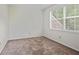 Bedroom with neutral carpet, natural lighting, and a window with blinds at 2117 Bucktrout Pl, Dunwoody, GA 30338