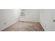 Bedroom with neutral carpet, natural lighting, and white walls at 2117 Bucktrout Pl, Dunwoody, GA 30338