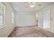 A bright bedroom with multiple closets, and a ceiling fan at 2117 Bucktrout Pl, Dunwoody, GA 30338