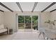 Bright dining room with sliding glass doors leading to deck, creating a seamless indoor-outdoor living at 2117 Bucktrout Pl, Dunwoody, GA 30338