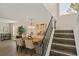 Open layout living area and stairs with natural light, creating a spacious and inviting home at 2117 Bucktrout Pl, Dunwoody, GA 30338
