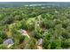 An aerial view shows a neighborhood surrounded by mature trees and a golf course at 4079 Essex Dr, Villa Rica, GA 30180