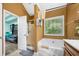 Comfortable bathroom features a bathtub, walk-in shower, and vanity at 4079 Essex Dr, Villa Rica, GA 30180