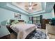 Relaxing bedroom with trey ceilings, a comfortable sitting area, and ample closet space at 4079 Essex Dr, Villa Rica, GA 30180