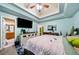 Bright and airy main bedroom with TV features trey ceiling with attached bathroom at 4079 Essex Dr, Villa Rica, GA 30180