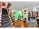 Bright foyer showcasing hardwood floors and easy access to other rooms at 4079 Essex Dr, Villa Rica, GA 30180