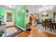 A view of the home's interior showing the front entry, dining room, and kitchen at 4079 Essex Dr, Villa Rica, GA 30180