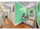 Bright foyer featuring hardwood floors, vibrant wall colors, and a charming welcome display at 4079 Essex Dr, Villa Rica, GA 30180