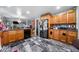 A kitchen with granite counters, stainless steel appliances, and wood cabinets at 4079 Essex Dr, Villa Rica, GA 30180