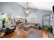 Spacious living room with vaulted ceilings, hardwood floors, and ample natural light at 4079 Essex Dr, Villa Rica, GA 30180