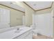 Bathroom with a large mirror, white vanity, and a combined shower and bathtub at 1558 Park Knoll Trl, Lawrenceville, GA 30043