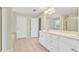 Bathroom with a large mirror, vanity, a separate shower, and a tub for ultimate relaxation at 1558 Park Knoll Trl, Lawrenceville, GA 30043