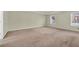 Spacious bedroom with two windows and plush carpeting; perfect for relaxation and comfort at 1558 Park Knoll Trl, Lawrenceville, GA 30043