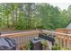 Back deck with room for flowers, grill, and plenty of seating to relax at 3194 Mill Springs Cir, Buford, GA 30519