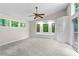 Spacious bedroom with large windows providing abundant natural light and scenic views of the surrounding greenery at 4700 Township Walk, Marietta, GA 30066