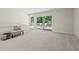 Spacious bonus room with sliding glass doors to a deck and neutral carpet at 4700 Township Walk, Marietta, GA 30066