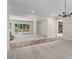 Open concept dining and living area, leading to a private deck and with fireplace at 4700 Township Walk, Marietta, GA 30066