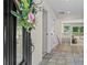 Inviting foyer with decorative tile flooring and a view to the bright living space with deck access at 4700 Township Walk, Marietta, GA 30066
