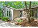 Charming home featuring a stone accent wall and well-maintained landscaping around the welcoming front entrance at 4700 Township Walk, Marietta, GA 30066