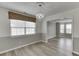 Dining area with natural light, connects the adjacent living spaces with its open layout at 5555 Sugar Crossing Dr, Sugar Hill, GA 30518
