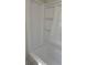 Clean bathroom featuring a new tub and shower combination, offering a modern look at 725 S Fork Sw Dr, Marietta, GA 30008
