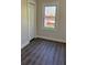 Cozy bedroom featuring new, stylish flooring, neutral paint and closet at 725 S Fork Sw Dr, Marietta, GA 30008