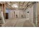 Unfinished basement featuring insulation, concrete floors, and potential for customization at 116 Patrick Way, Marietta, GA 30064