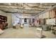 Spacious unfinished basement with exposed ceiling, wooden framing, and concrete flooring at 116 Patrick Way, Marietta, GA 30064