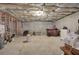 Unfinished basement ready for customization with bar and concrete flooring at 116 Patrick Way, Marietta, GA 30064