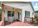 Charming outdoor deck with dining area, perfect for enjoying meals and relaxation in a serene setting at 116 Patrick Way, Marietta, GA 30064