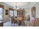 Formal dining room with a chandelier and classic furnishings at 116 Patrick Way, Marietta, GA 30064