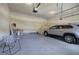 Spacious two-car garage with ample room for parking and storage, featuring neutral walls and concrete flooring at 116 Patrick Way, Marietta, GA 30064