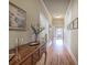 Hallway with hardwood floors and view to front door and hallway at 116 Patrick Way, Marietta, GA 30064