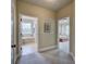 Bright hallway featuring doorways into the bathroom and main bedroom at 116 Patrick Way, Marietta, GA 30064