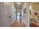 Hallway featuring hardwood floors and neutral walls at 116 Patrick Way, Marietta, GA 30064