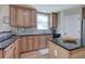 Spacious kitchen with wood cabinets, granite countertops, and an island at 116 Patrick Way, Marietta, GA 30064