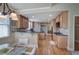Open concept kitchen with stainless appliances and wooden floors at 116 Patrick Way, Marietta, GA 30064