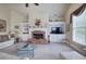 Bright living room with fireplace, built-in shelving, and natural light at 116 Patrick Way, Marietta, GA 30064