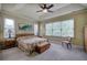 Spacious main bedroom boasts trey ceilings and abundant natural light from large windows at 116 Patrick Way, Marietta, GA 30064