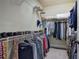 Organized walk-in closet with ample storage and hanging space for clothes and shoes at 116 Patrick Way, Marietta, GA 30064