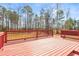 Spacious wooden deck with views of private backyard at 12348 Hillcrest Dr, Hampton, GA 30228
