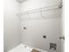 Laundry room with hookups for a washer and dryer, with wire shelving above at 12348 Hillcrest Dr, Hampton, GA 30228