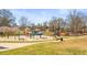 Vibrant playground area equipped with colorful play structures and ample space for activities at 12348 Hillcrest Dr, Hampton, GA 30228